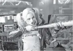  ?? — Courtesy Warner Bros.-DC ?? Robbie’s Harley Quinn takes aim at saving ‘Suicide Squad’.