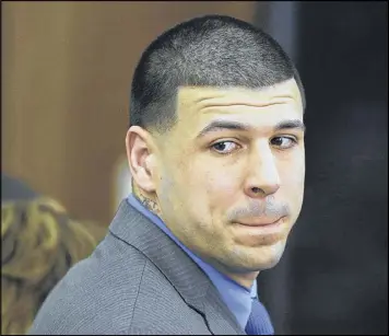  ?? STEPHAN SAVOIA / ASSOCIATED PRESS ?? Former New England Patriots tight end Aaron Hernandez turns toward the jury as he reacts to his double-murder acquittal Friday in Boston. Jurors found Hernandez not guilty of first-degree murder in the killings of two men in 2012.