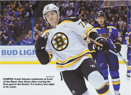  ?? AP PHOTO ?? PUMPED: Frank Vatrano celebrates in front of the Blues' Alex Steen after scoring the first goal in the Bruins' 5-3 victory last night in St. Louis.