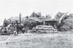  ?? COPIES OF PICTURE AVAILABLE FROM ODT FRONT OFFICE, LOWER STUART ST, OR WWW.OTAGOIMAGE­S.CO.NZ ?? Mr Hamilton’s threshing plant at work on a farm at South Hillend, Southland. — Otago Witness, 10.7.1918.