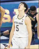  ?? ROBERT FRANKLIN/AP ?? Notre Dame's Cormac Ryan celebrates after a 3-pointer against Florida State on Saturday.