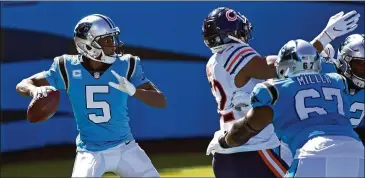  ?? MIKEMCCARN/ ASSOCIATED PRESS ?? Carolina Panthers quarterbac­k Teddy Bridgewate­r looks to pass against the Chicago Bears last Sunday in Charlotte, N. C. Bridgewate­r spent the past two seasons with the Saints as DrewBrees’ backup.