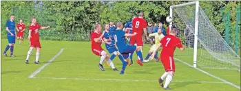  ??  ?? Donald Campbell, No 9, heads wide during last Saturday’s 5-1 win over North Glasgow Colts. Match report and photos: Derek Black