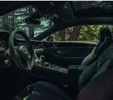  ??  ?? Above and left: plenty of leather, wood and milled alloy on show in the GT’S classy cabin; centre console’s Côtes de Genève finish is inspired by that found on the movements of high-end wristwatch­es. Far left: test car’s 22-inch alloys are part of the £13,515 Mulliner Driving option; standard wheels are 20-inch items