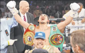  ?? Erik Verduzco
Las Vegas Review-journal ?? Teofimo Lopez celebrates his TKO against Pedro Campa in the seventh round of their junior welterweig­ht fight at Resorts World Events Center on Saturday.