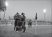  ?? [KYLE ROBERTSON/DISPATCH] ?? Crew players, celebratin­g a goal in a 2-0 win over the Galaxy on Aug. 23, have been playing before less-than-capacity crowds at Mapfre Stadium.