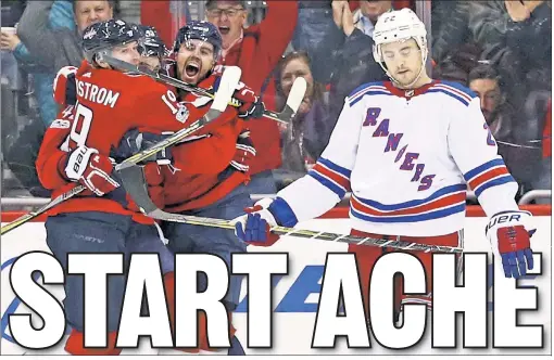  ??  ?? SLOW COOKED: Kevin Shattenkir­k (right) puts his head down as the Capitals celebrate Matt Niskanen’s goal, which proved to be the winner, in the Rangers’ 4-2 loss in Washington on Friday night. It spoiled the Blueshirts’ attempt to win after falling in...