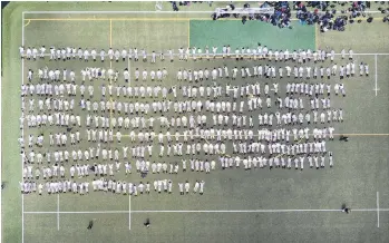  ?? PHOTO: SUPPLIED ?? Graphic message . . . Four hundred and forty Year 9 and 10 students at Wellington College illustrate the human toll of a pandemic.