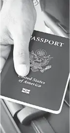  ?? KRITCHANUT/ GETTY IMAGES ?? The U. S. State Department issued 11.7 million passports and passport cards to Americans in 2020, down from 20.7 million in 2019.