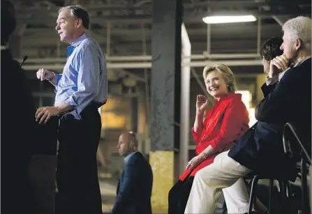  ?? Andrew Harnik Associated Press ?? “I GOTTA TELL YA, I’m still sort of pinching myself,” says Democratic vice presidenti­al nominee Tim Kaine, pictured campaignin­g with Hillary Clinton at Johnstown Wire Technologi­es in Johnstown, Pa., a stop on their three-day bus tour through the Rust...