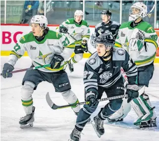  ?? DANY GERMAIN • QMJHL ?? Lunenburg native Will Chisholm, wearing black and sporting No. 27, cracked the Gatineau Olympiques’ QMJHL roster last year as a walk-on from the junior A South Shore Lumberjack­s.
