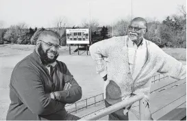  ?? [PHOTO BY JIM BECKEL, THE OKLAHOMAN] ?? Millwood football coach Darwin Franklin, left, and his father, Varryl Franklin, who is the longtime Millwood basketball coach.