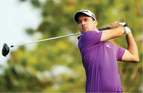  ?? MIKE EHRMANN/GETTY IMAGES ?? Nick Taylor of Canada plays his shot from the fourth tee during the second round of The Players Championsh­ip on The Stadium Course at TPC Sawgrass on Friday in Ponte Vedra Beach, Fla.