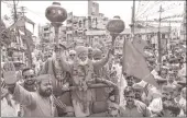  ?? PTI ?? BJP MP Sakshi Maharaj takes part in 'Gada Yatra' organised by Hindu Seva Parishad on the occasion of Hanuman Jayanti, in Jabalpur.