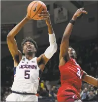  ?? Associated Press file photo ?? UConn’s Isaiah Whaley (5), seen her in a game from last season, matched his career high in scoring in Thursday’s AAC tournament win over USF.