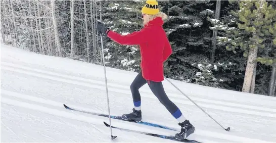  ?? JOSEFA CAMERON ?? Paulette Cameron enjoys a cross-country ski day after a recent snowfall. More and more people, of all ages, have been skiing since the pandemic began.