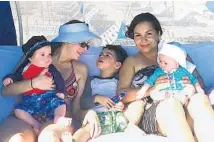  ?? CATHY PARETO /COURTESY ?? The first gay couple married legally in Florida, Cathy Pareto and Karla Arguello, with their kids Matteo, Enzo and Lucia, spent New Year’s Eve day in typical South Florida fashion — at the beach.