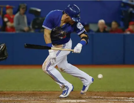  ?? TODD KOROL/TORONTO STAR ?? Josh Donaldson, who homered in the second inning, was hit by former teammate Liam Hendriks in the sixth. “I don’t like getting hit,” Donaldson admitted.