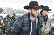  ?? ROB KERR / AFP ?? Ammon Bundy, leader of a militia group, makes his way to the Malheur National Wildlife Refuge in Burns, Oregon, earlier this month. He was among those arrested on Tuesday.