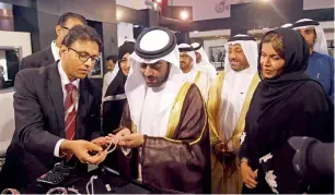  ?? Photos by M.Sajjad ?? Shaikh Khalid bin Abdullah bin Sultan Al Qasimi tours the 40th edition of the MidEast Watch and Jewellery Show at Expo Centre Sharjah on Tuesday; and below exhibitors display their products at the show. —