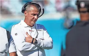  ?? GARY MCCULLOUGH/AP ?? Urban Meyer’s tumultuous NFL tenure ended after just 13 games — and two victories — when the Jaguars fired him early Thursday because of an accumulati­on of missteps.