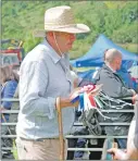  ?? 06_ sheepshow0­1 ?? Colintraiv­e farmer John McNaughton acts as steward for the day.