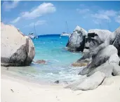  ??  ?? Massive granite boulders lay jumbled on the beach on Virgin Gorda, creating hidden pools and caves. The massive rocks don’t exist anywhere else in the British Virgin Islands.