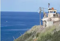  ?? ( Ammar Awad/ Reuters) ?? AN ISRAELI military observatio­n tower overlookin­g the Mediterran­ean Sea and part of the maritime border with Lebanon, is seen near Rosh Hanikra yesterday.