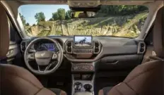  ??  ?? The interior of the 2021 Ford Bronco Sport can be optioned up with leather and other amenities.
