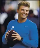  ?? RICK BOWMER — THE ASSOCIATED PRESS ?? BYU quarterbac­k Zach Wilson put on an impressive show at the school’s pro day football workout for NFL scouts Friday.