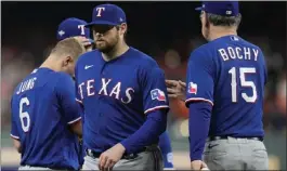  ?? GODOFREDO A. VASQUEZ – THE ASSOCIATED PRESS ?? Rangers manager Bruce Bochy takes Jordan Montgomery, center, out of Sunday's game.