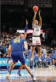  ?? Jessica Hill/Associated Press ?? UConn’s Jordan Hawkins (24) shoots against Xavier in Storrs last week.