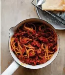  ?? ?? Anna Jones’ puy lentil spaghetti ‘bolognese’ – the main effort involved is in waiting for the sauce to thicken. Photograph: Matt Russell/The Guardian. Food styling: Rosie Ramsden. Prop styling: Louie Waller.