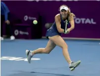  ?? AFP ?? Caroline Wozniacki returns the ball to Monica Niculescu.—