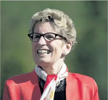  ?? CANADIAN PRESS FILES ?? Ontario Premier Kathleen Wynne announced the Ontario Retirement Pension Plan in 2014, but Finance Ministry documents released Thursday reveal work began at least a year earlier. In June, the province announced it would axe the ORPP after a deal was...