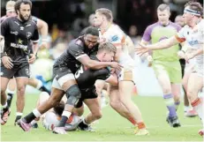  ?? Picture: STEVE HAAG SPORTS ?? GOOD SHOW: James Lang of Edinburgh tackles Ethan Hooker of the Sharks during their United Rugby Championsh­ip match in Durban on Saturday
