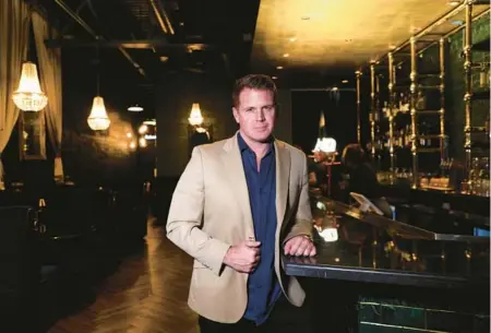  ?? CARLINE JEAN/SOUTH FLORIDA SUN SENTINEL ?? Restaurate­ur Memphis Garrett, shown here inside No Man’s Land in Fort Lauderdale, is planning to open Whaler’s Catch, a seafood kitchen and oyster bar, this month.