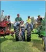  ?? REGISTER CITIZEN FILE PHOTO ?? 4-H members show off their machinery at the fair.