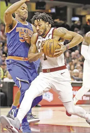  ?? AP ?? Derrick Rose drives hard to basket Sunday against his former team, which apparently had little interest in bringing the point guard back to MSG in offseason.