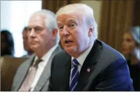  ?? EVAN VUCCI — THE ASSOCIATED PRESS ?? Secretary of State Rex Tillerson listens as President Donald Trump announces that the United States will designate North Korea a state sponsor of terrorism during a cabinet meeting Monday at the White House.