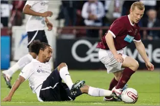  ??  ?? MENTAL SCARS: Driver avoids a tackle from Spurs’ Benoit AssouEkott­o in Hearts’ humiliatin­g 5-0 Europa League defeat