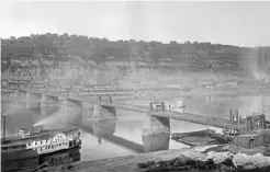  ??  ?? Archives and Special Collection­s Department of the University of Pittsburgh
John Roebling’s Monongahel­a Suspension Bridge after several years of service.