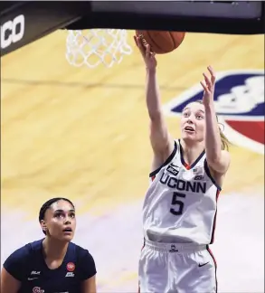  ?? Jessica Hill / Associated Press ?? UConn freshman Paige Bueckers averages a team-high 35.8 minutes per game.