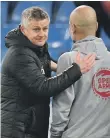  ?? AFP ?? Ole Gunnar Solskjaer, left, has won more games than he has lost against Pep Guardiola