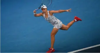  ?? PAUL CROCK AFP ?? AUSTRALIA’S Ashleigh Barty in action at the Australian Open.
|