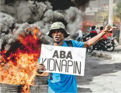  ?? AFP ?? Protesta en Puerto Príncipe por el aumento de los secuestros perpetrado­s por pandillas