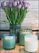  ?? WAXCANDLE BAR.COM ?? Atlanta’s Teri Xerogeanes creates eco-chic candle collection­s that bring to mind a favorite getaway.