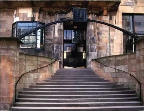  ?? ?? Glasgow School of Art’s Mackintosh Building before the double-fire, and the Reid Building, right, which opened in 2014 as an extension to The Mack