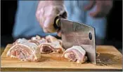  ??  ?? The recipe uses bone-in, dark-meat chicken cut into 2-inch pieces. Your butcher might do the chopping for you.
You can use boneless chicken thighs if you want to avoid chopping through the bones, but the flavor will not be as deep.
pounds bone-in,...
