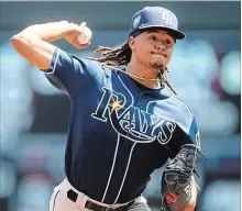  ?? ASSOCIATED PRESS FILE PHOTO ?? Chris Archer is pictured in action against the Minnesota Twins on July 14 in Minneapoli­s. Archer’s been the leader of the Rays rotation for years.